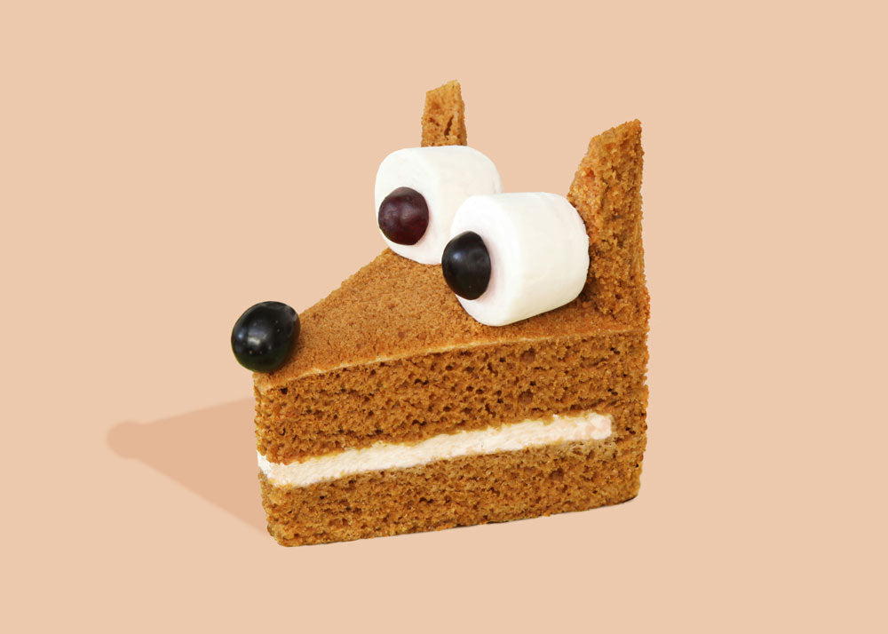 a piece of brown cake that looks like a dog by Helga Stenztel for Lunch Lady