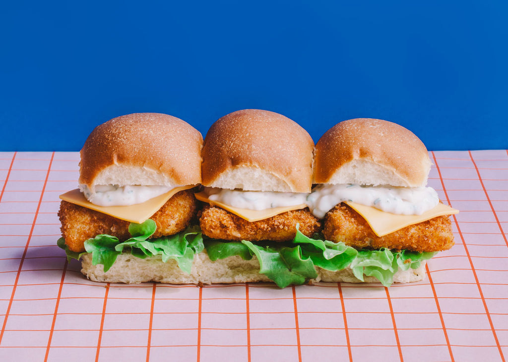 a photo of three mini fish burgers next to each other for Lunch Lady Magazine